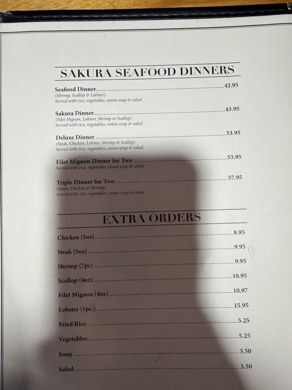 Printed menu with lunch and dinner sections.